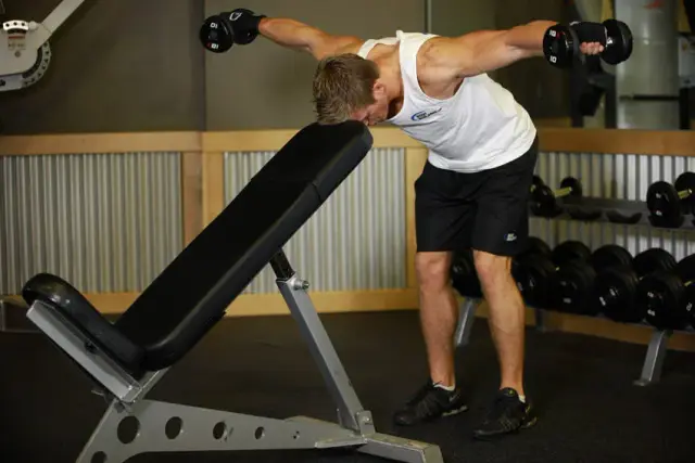 Bent Over Dumbbell Rear Delt Raise With Head On Bench 2