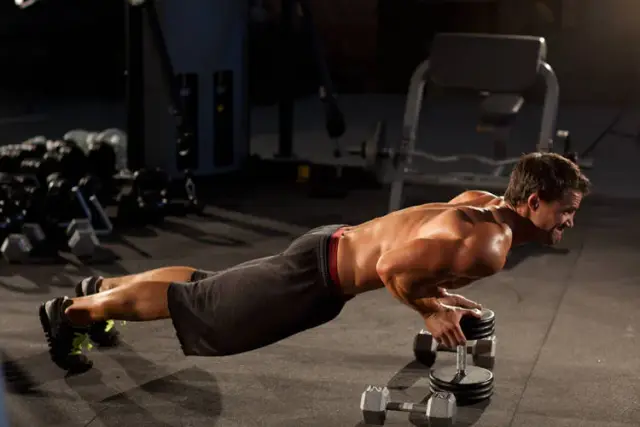 Close-Grip Push-Up off of a Dumbbell 2
