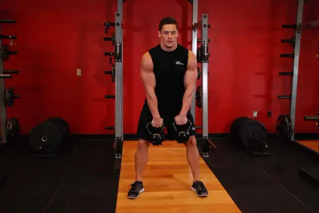 Double Kettlebell Alternating Hang Clean — Start