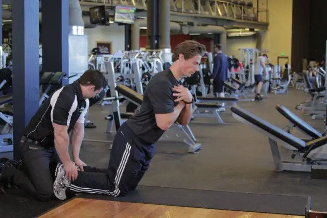 Floor Glute-Ham Raise — End