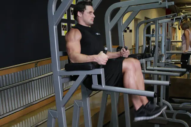 Knee/Hip Raise On Parallel Bars — End