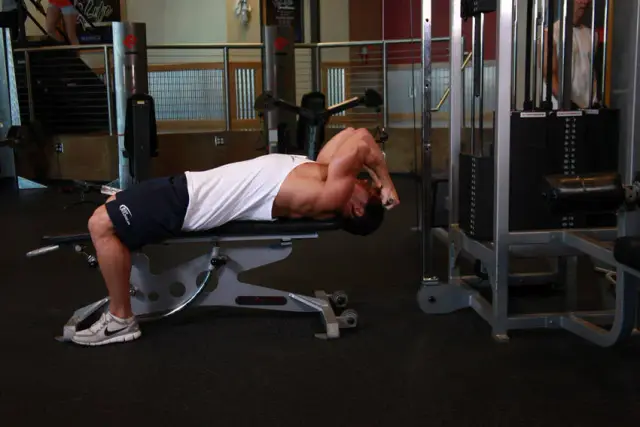 Lying Close-Grip Bar Curl On High Pulley 2