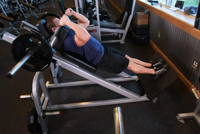 Narrow Stance Hack Squats — End