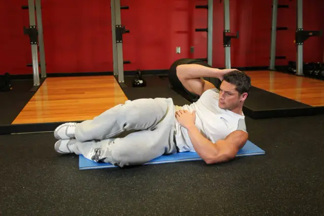 Oblique Crunches - On The Floor — End