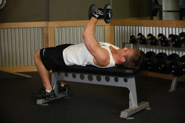 One-Arm Flat Bench Dumbbell Flye — End