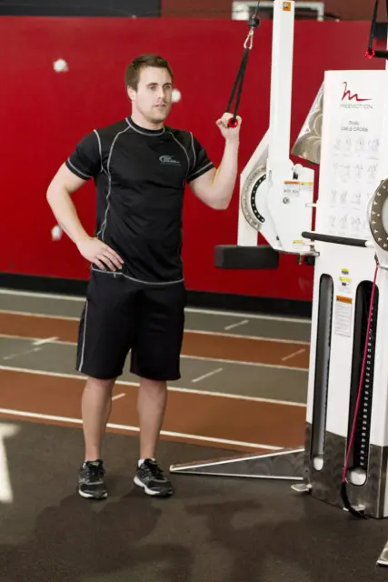 One-Arm High-Pulley Cable Side Bends — Start