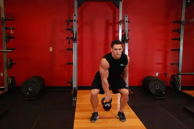 One-Arm Kettlebell Split Snatch — End