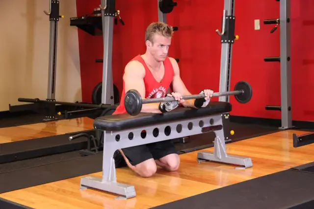 Palms-Down Wrist Curl Over A Bench 2