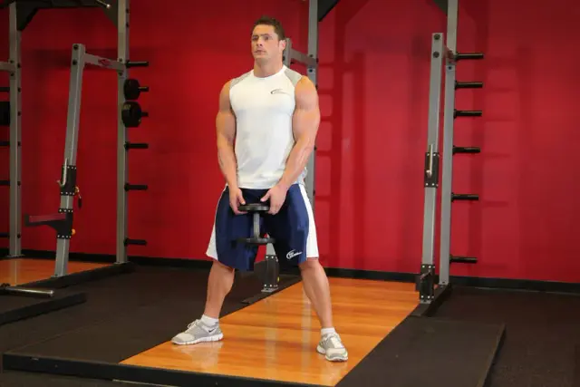 Plie Dumbbell Squat — Start
