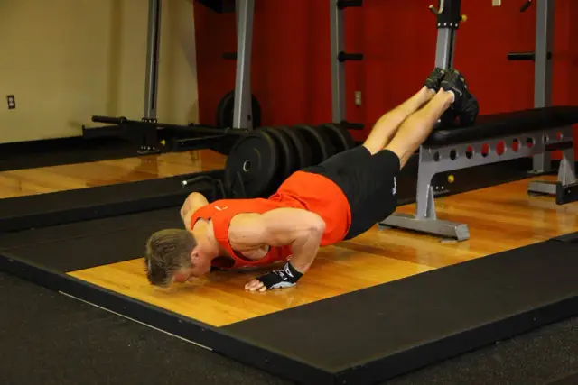 Push-Ups With Feet Elevated — End