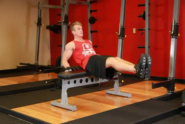 Seated Leg Tucks — End