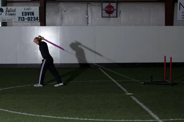 Sled Overhead Triceps Extension — Start
