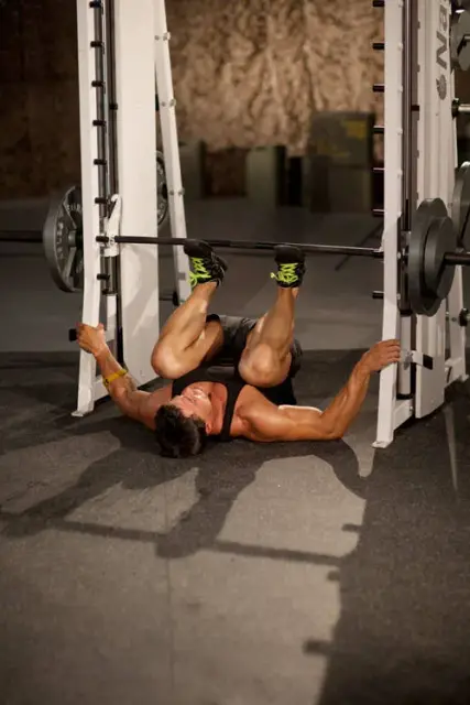 Smith Machine Leg Press — End