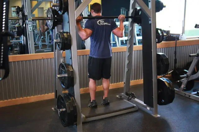 Smith Machine Reverse Calf Raises — End