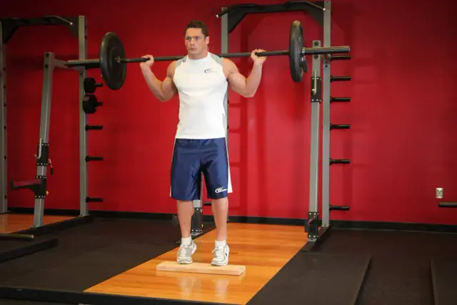 Standing Barbell Calf Raise — Start