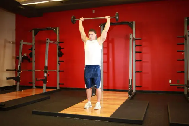 Standing Barbell Press Behind Neck — End