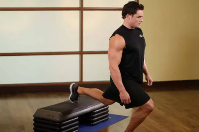 Standing Elevated Quad Stretch — Start