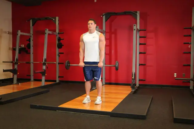 Standing Front Barbell Raise Over Head — Start