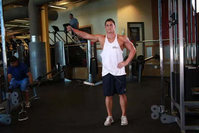 Standing Low-Pulley Deltoid Raise — Start