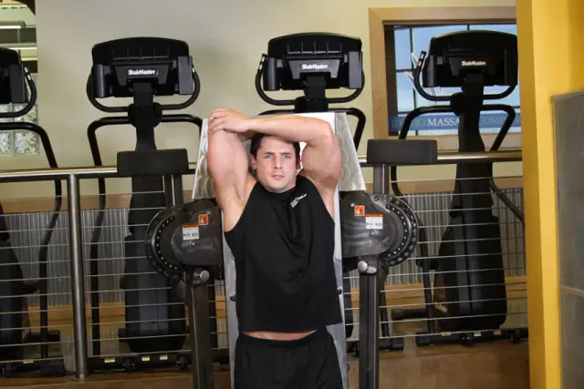 Standing Low-Pulley One-Arm Triceps Extension — Start