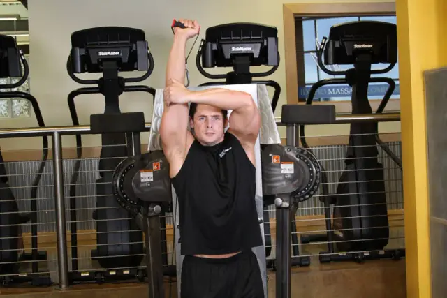 Standing Low-Pulley One-Arm Triceps Extension — End