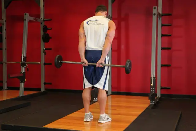 Standing Palms-Up Barbell Behind The Back Wrist Curl 2