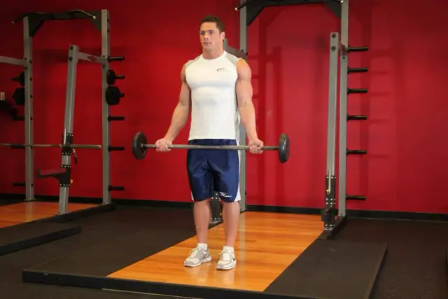 Wide-Grip Standing Barbell Curl 1